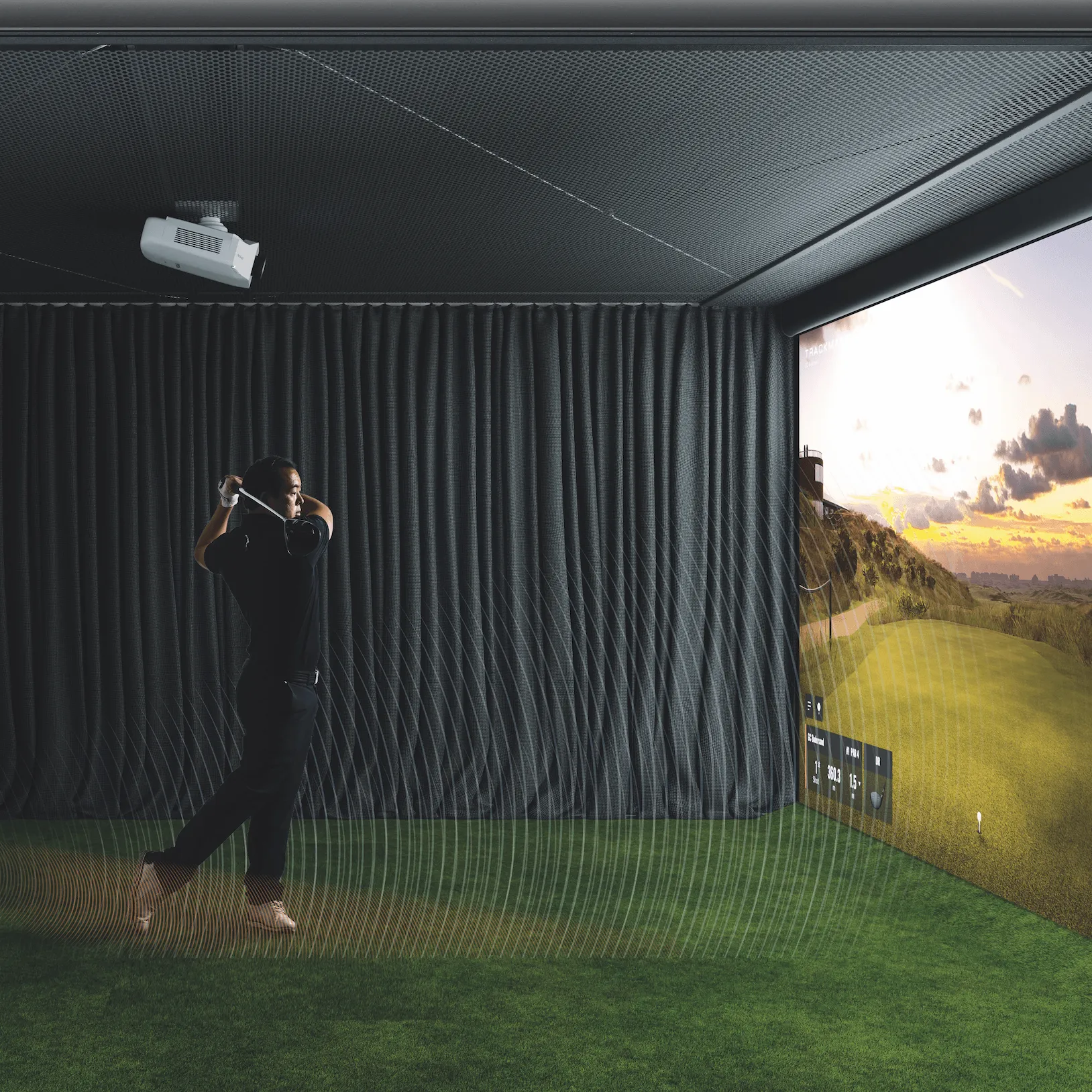 Person swinging a golf club in a home golf simulator setup with a projector displaying a golf course scene, emphasizing indoor golfing experience and practice.