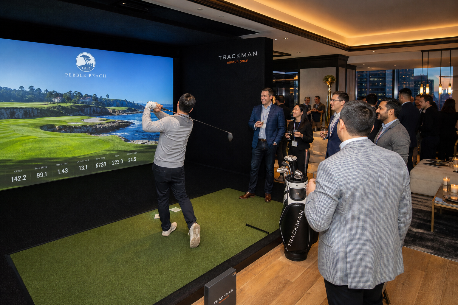Man swinging golf club in front of large screen displaying Pebble Beach golf course